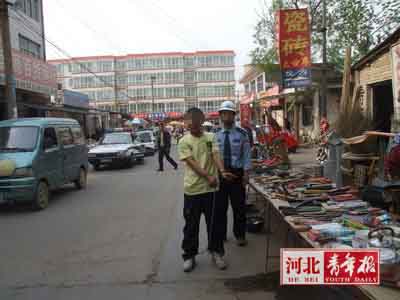 石家庄的哥被劫 身中7刀爬1里多地求救(图)